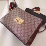 Gucci-GG-Women-GG-Padlock-Small-GG-Top-Handle-Bag-in-Beige-GG-Supreme-Canvas-1.jpg