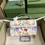 Gucci-Unisex-Animal-Print-MIni-Bag-Beige-Ebony-GG-Supreme-Canvas-1.jpg