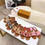Louis-Vuitton-LV-Women-Lock-It-Flat-Mule-Cognac-Brown-LV-Intials-Monogram-Flowers-1.jpg