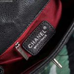 chanel_coco_caviar_lizard_quilted_mini_flap_bag_with_top-handle.jpg